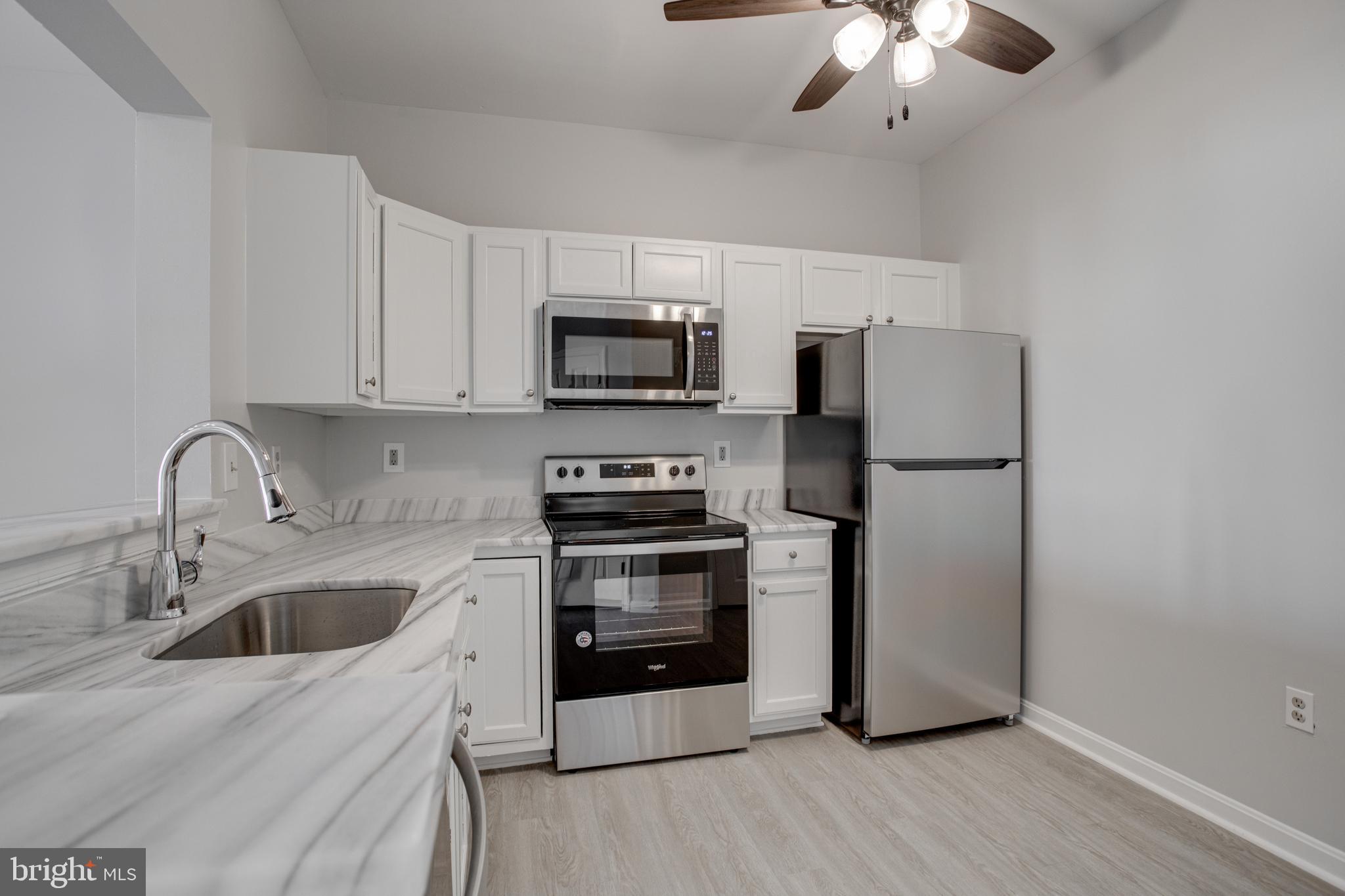 329 Assembly Point Court Odenton, MD 21113 - Photo 8 of 22 Gourmet Kitchen w/ NEW stainless steel appliances!
