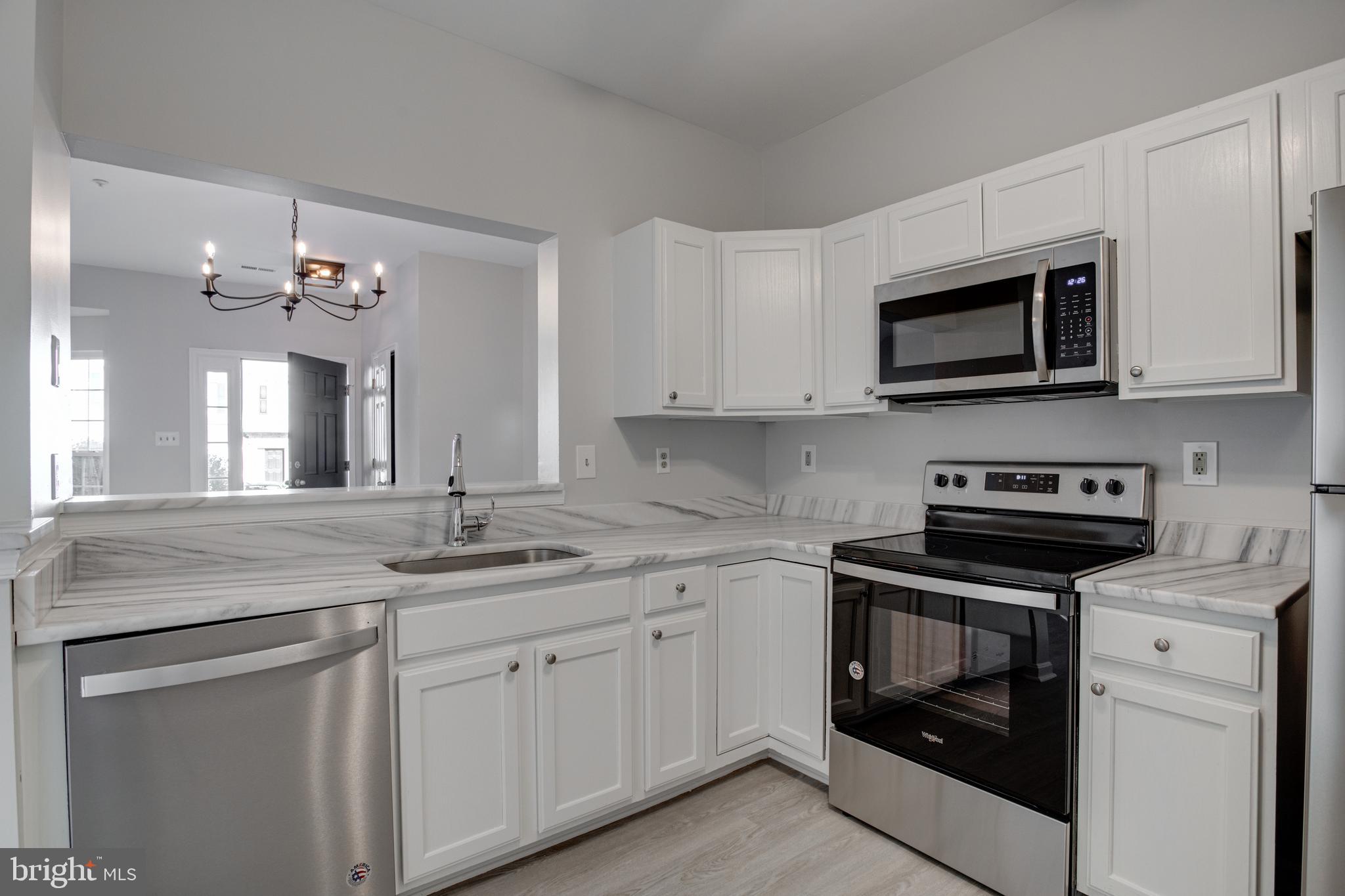 329 Assembly Point Court Odenton, MD 21113 - Photo 9 of 22 Gourmet Kitchen w/ NEW granite countertops!