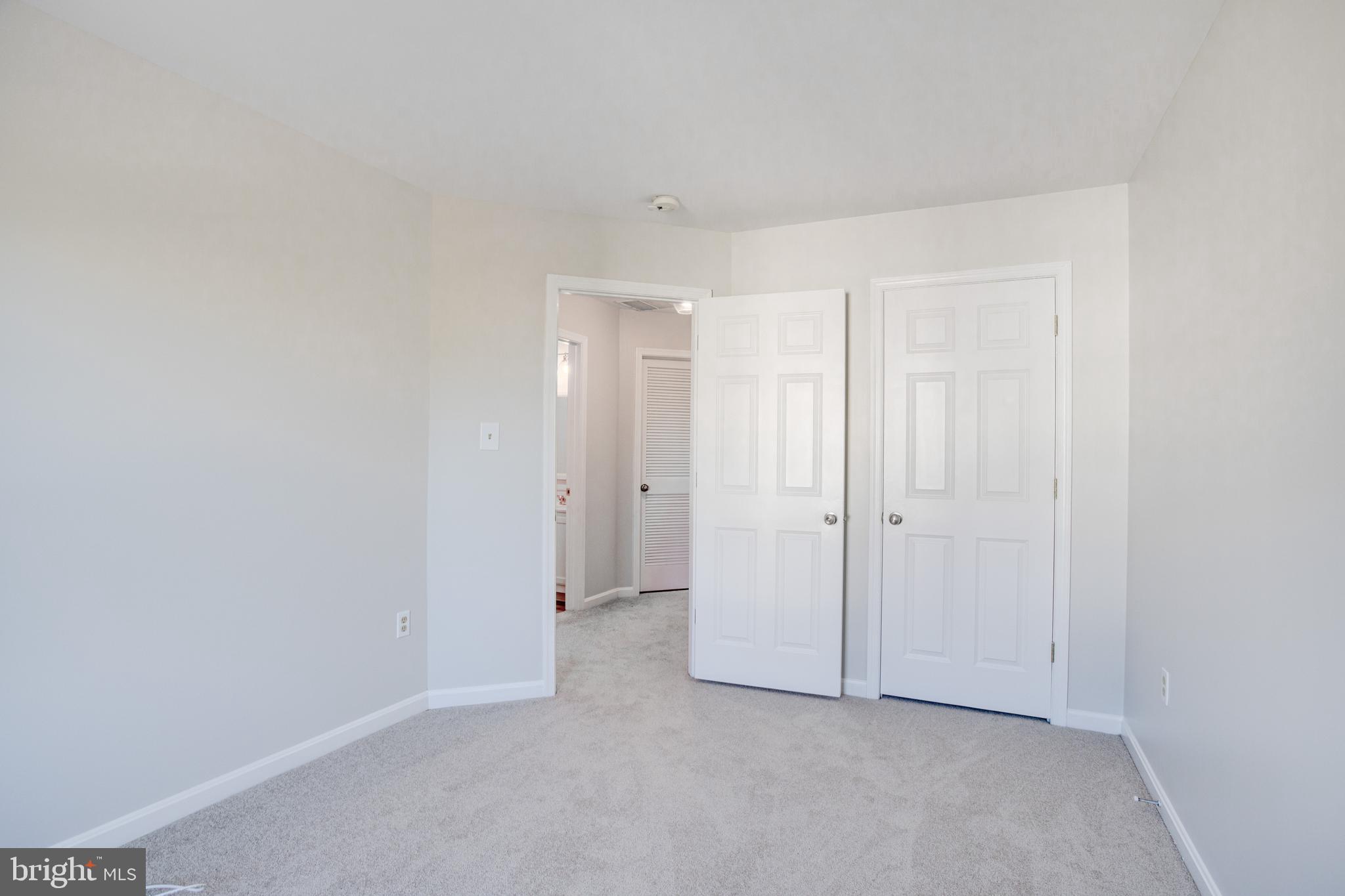 329 Assembly Point Court Odenton, MD 21113 - Photo 10 of 22 Bedroom 1 with NEW wall to wall carpeting!