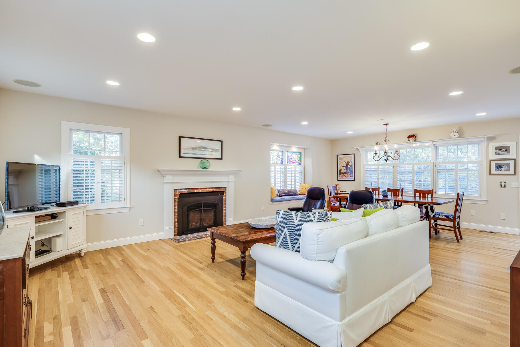 9 Ridgewood Road Orleans, MA 02653 - Photo 15 of 81 a living room with fireplace furniture and a flat screen tv