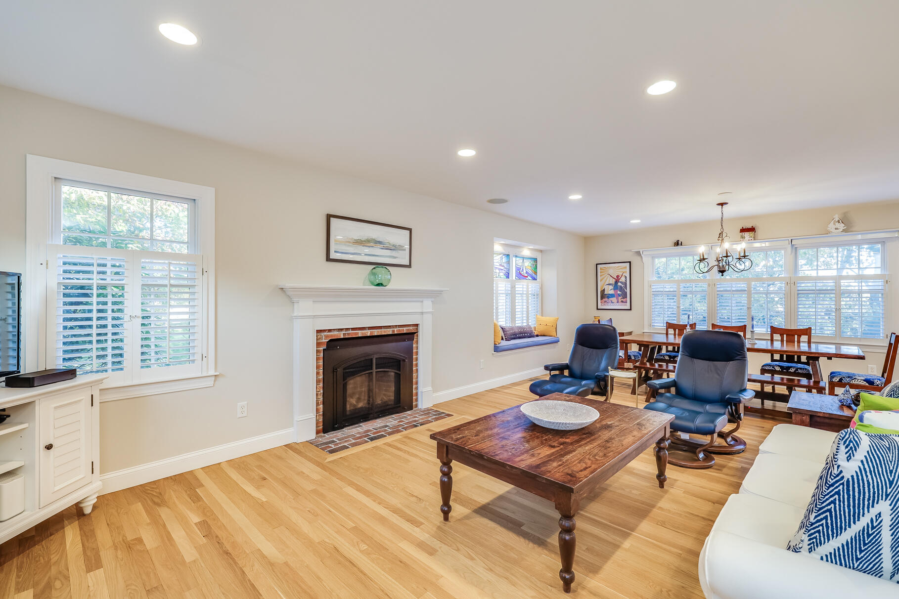 9 Ridgewood Road Orleans, MA 02653 - Photo 16 of 81 a living room with furniture fireplace and window