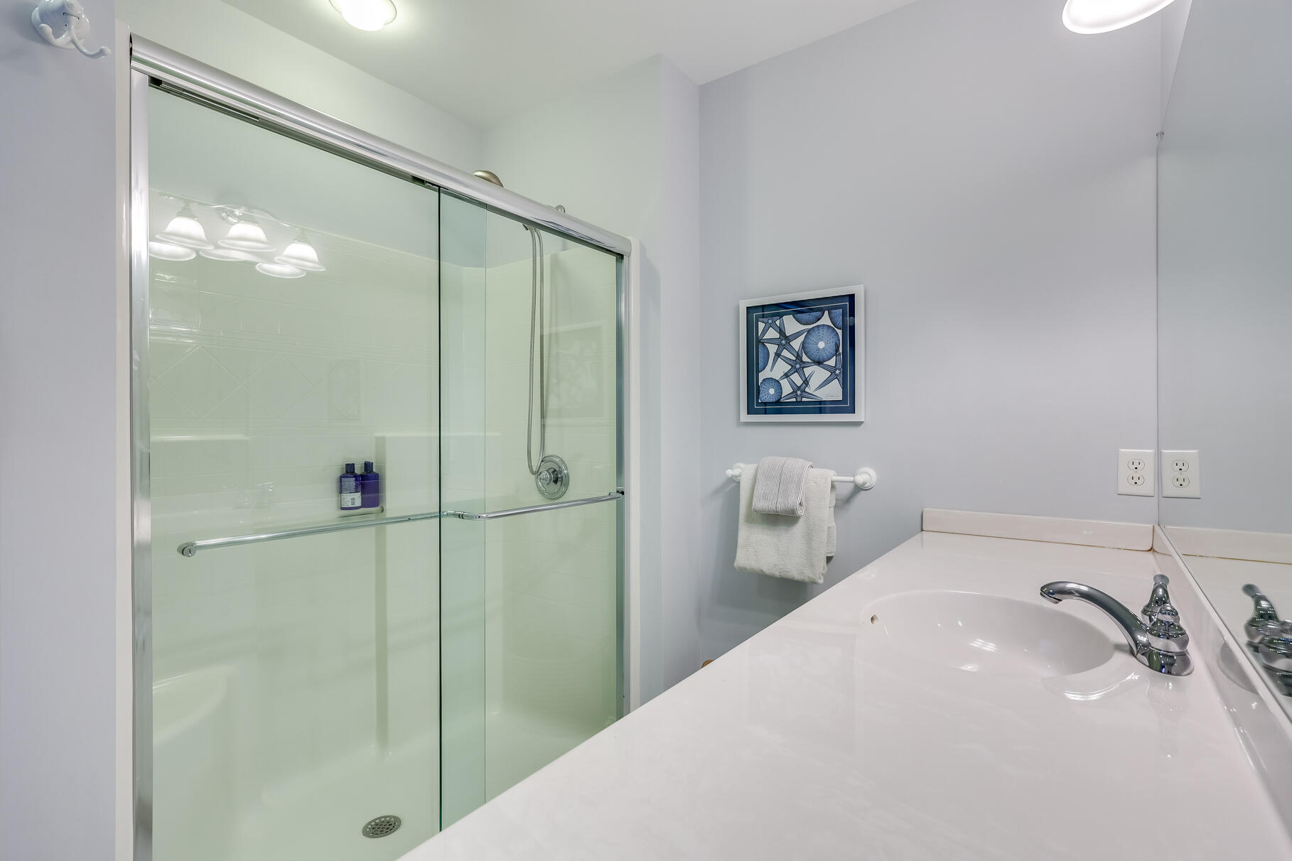 9 Ridgewood Road Orleans, MA 02653 - Photo 36 of 81 a bathroom with a sink and shower