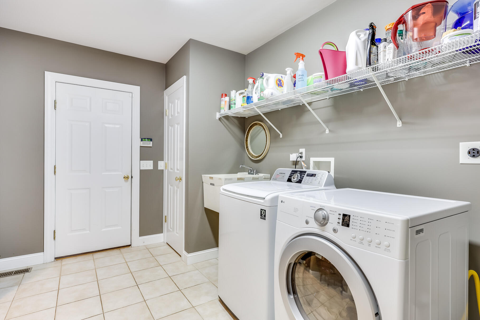 9 Ridgewood Road Orleans, MA 02653 - Photo 38 of 81 a view of storage and utility room with washer and dryer