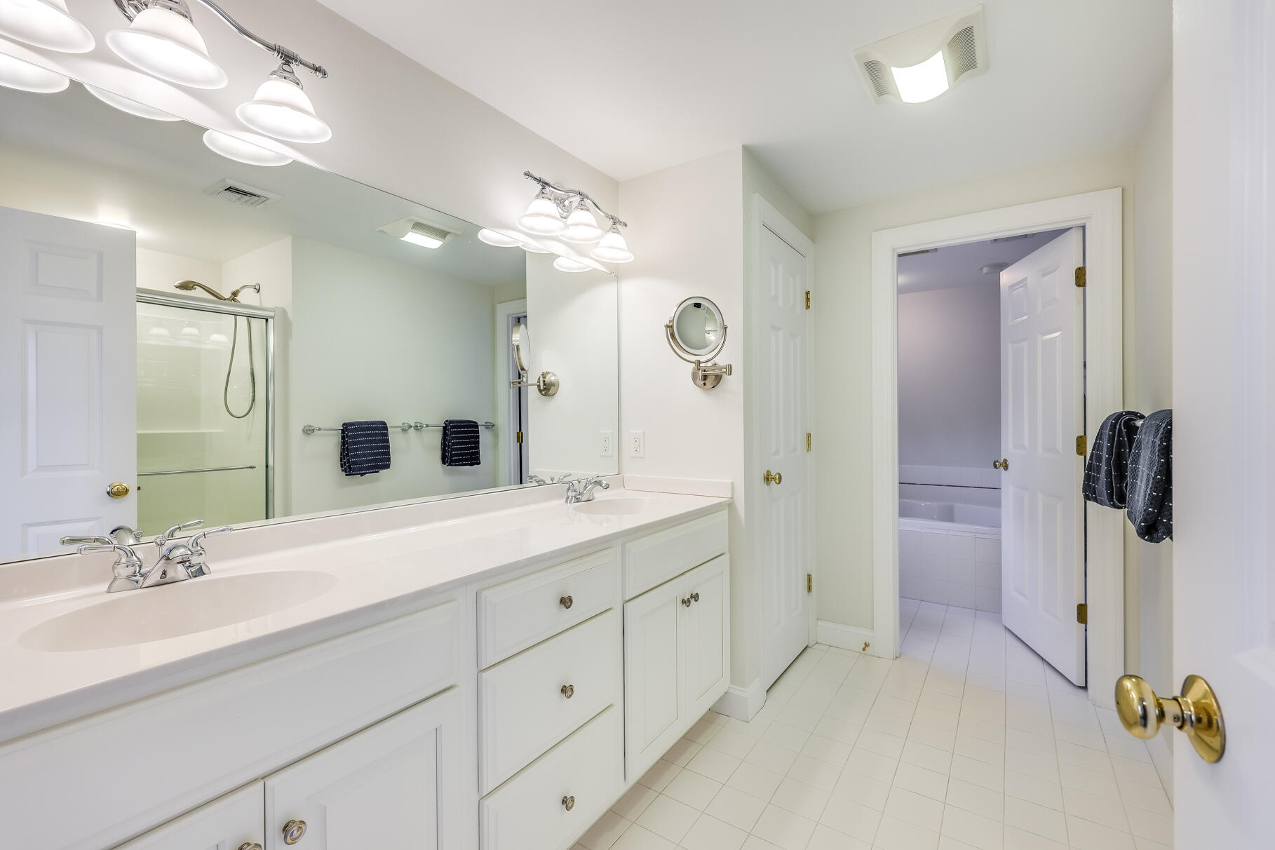 9 Ridgewood Road Orleans, MA 02653 - Photo 50 of 81 a bathroom with a double vanity sink mirror and shower