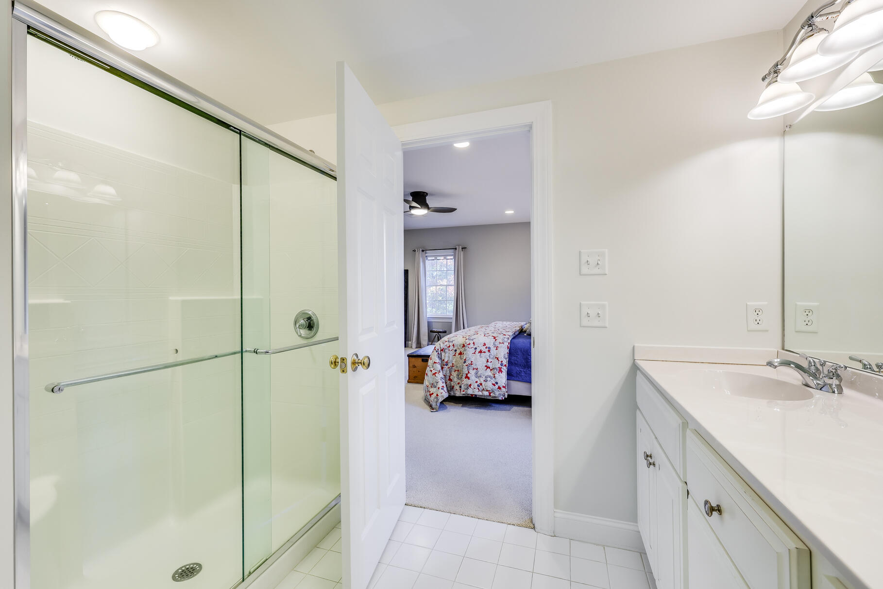 9 Ridgewood Road Orleans, MA 02653 - Photo 51 of 81 a en suite bathroom with a double vanity sink a mirror and shower