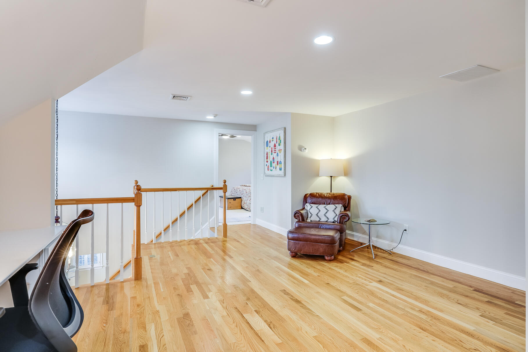 9 Ridgewood Road Orleans, MA 02653 - Photo 56 of 81 a bedroom with a bed and a lamp