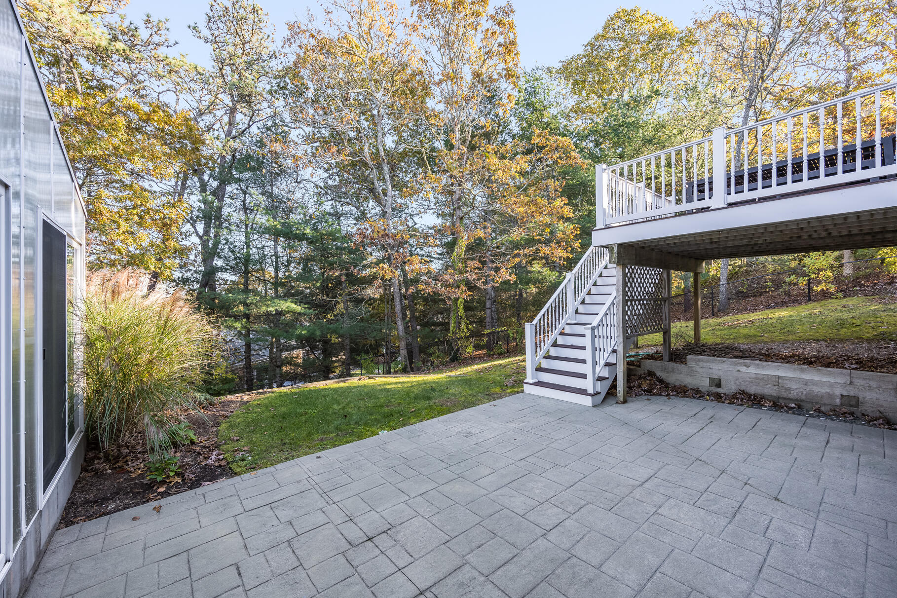 9 Ridgewood Road Orleans, MA 02653 - Photo 73 of 81 a view of a deck with a yard