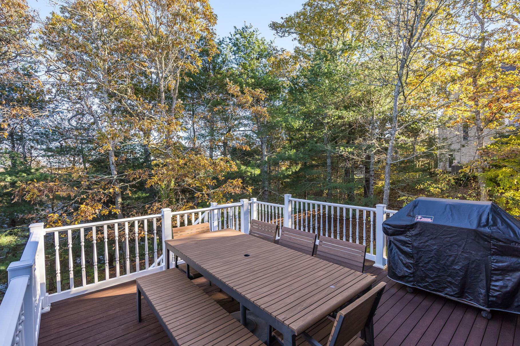 9 Ridgewood Road Orleans, MA 02653 - Photo 75 of 81 a view of a wooden deck and a yard