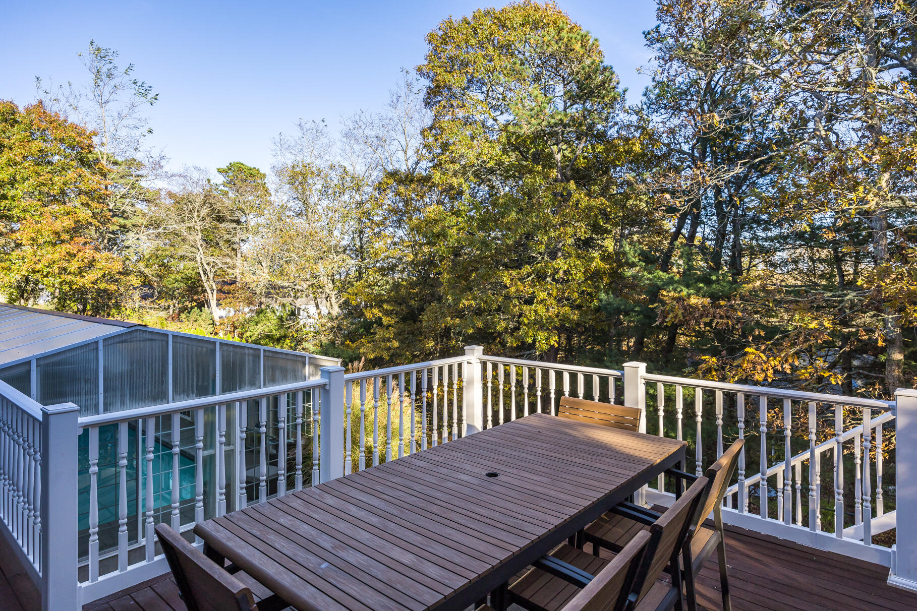 9 Ridgewood Road Orleans, MA 02653 - Photo 78 of 81 a view of a wooden deck with a patio