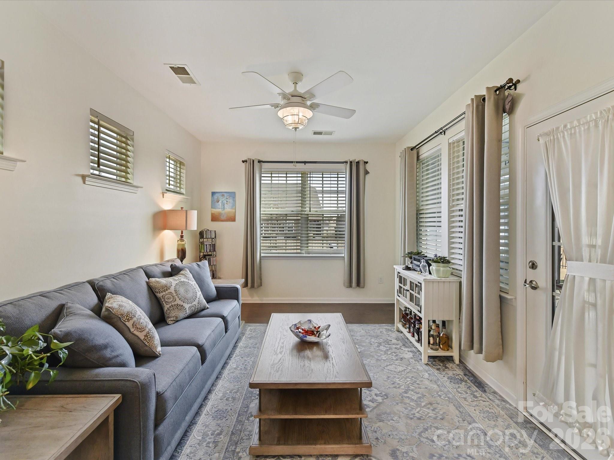 3302 Oliver Stanley Trail Lancaster, SC 29720 - Photo 13 of 48 a living room with furniture a window and a table
