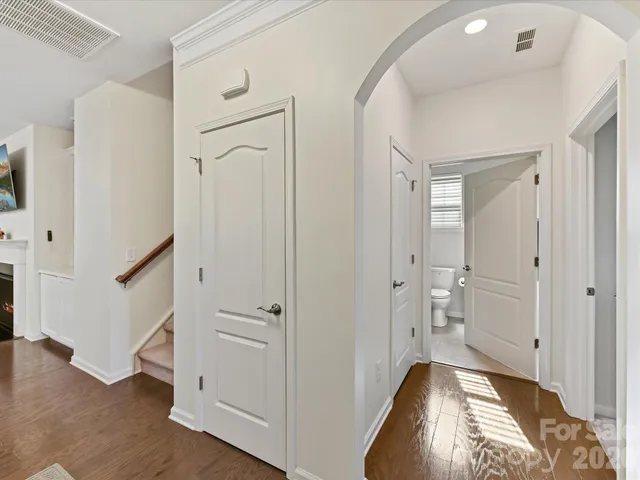a view of a bathroom with a tub and shower