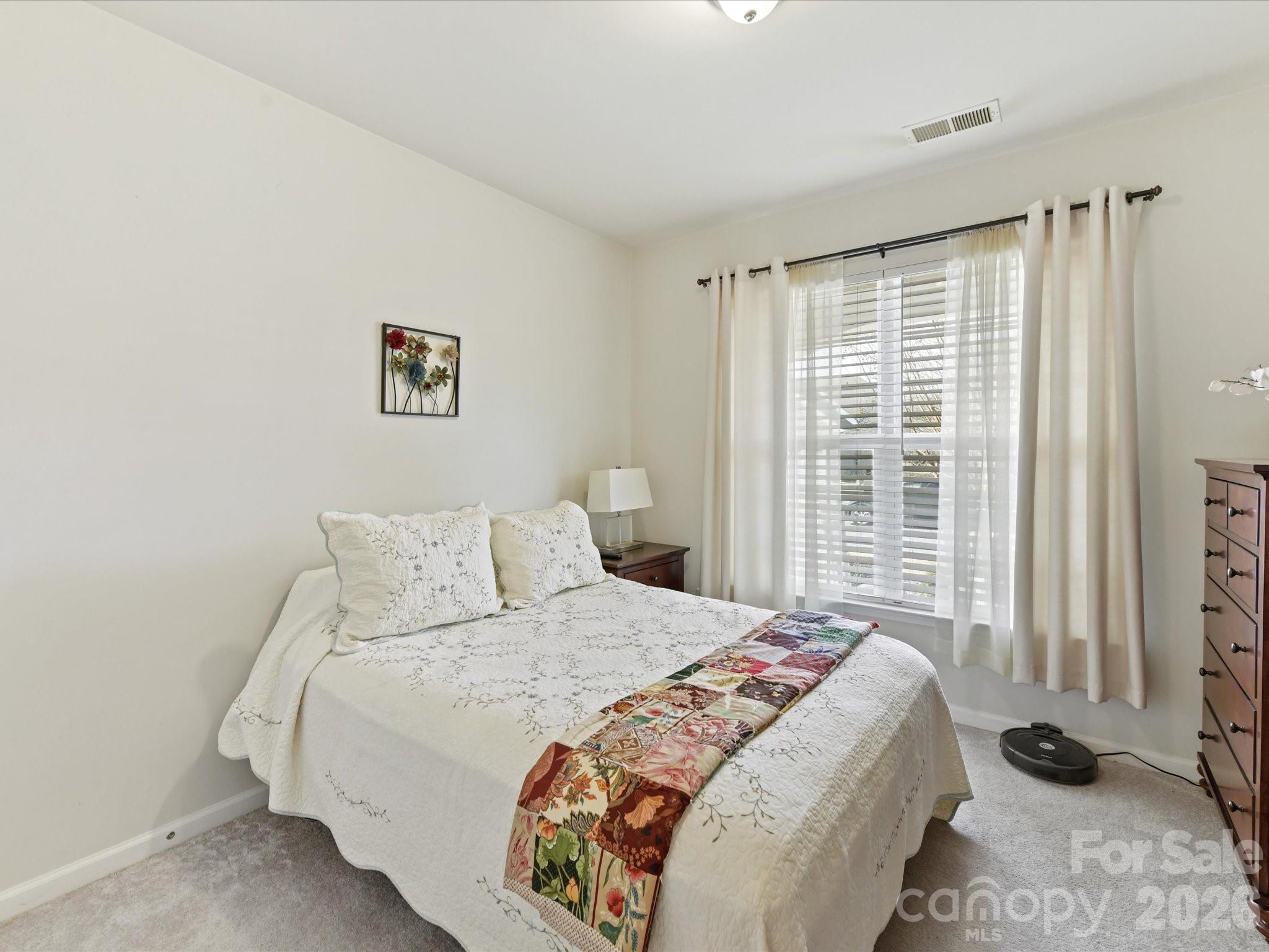3302 Oliver Stanley Trail Lancaster, SC 29720 - Photo 22 of 48 a bedroom with a bed and a window