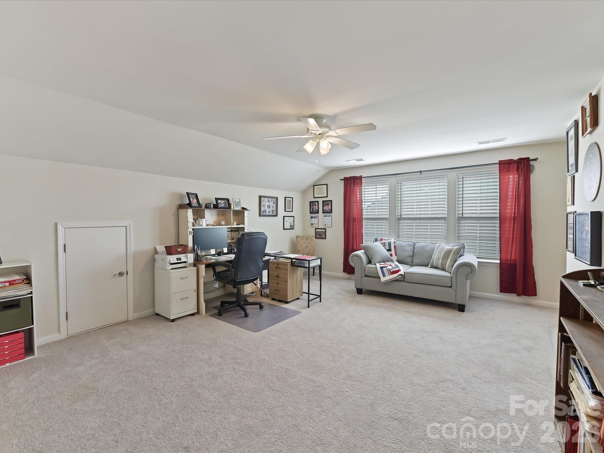 3302 Oliver Stanley Trail Lancaster, SC 29720 - Photo 28 of 48 a bedroom with furniture and a large window