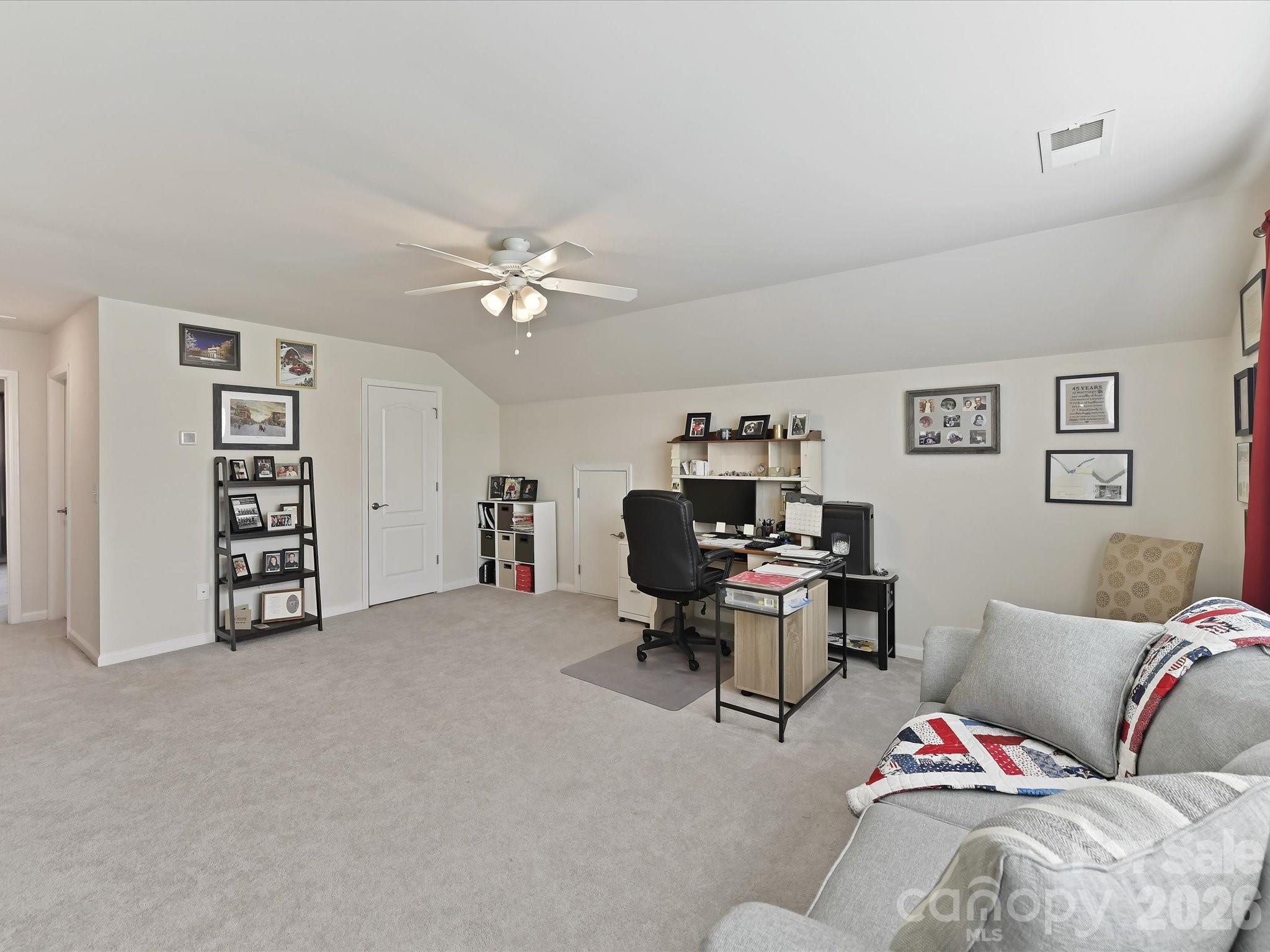 3302 Oliver Stanley Trail Lancaster, SC 29720 - Photo 29 of 48 a living room with furniture and white walls