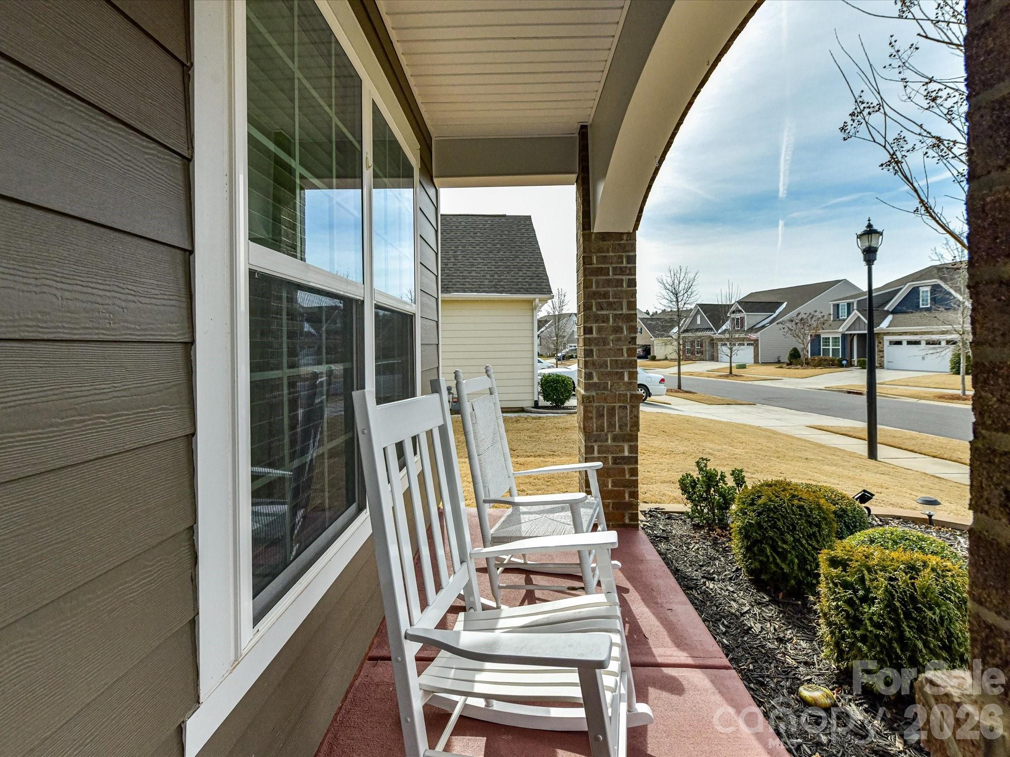 3302 Oliver Stanley Trail Lancaster, SC 29720 - Photo 3 of 48 a view of balcony with two chairs and potted plants