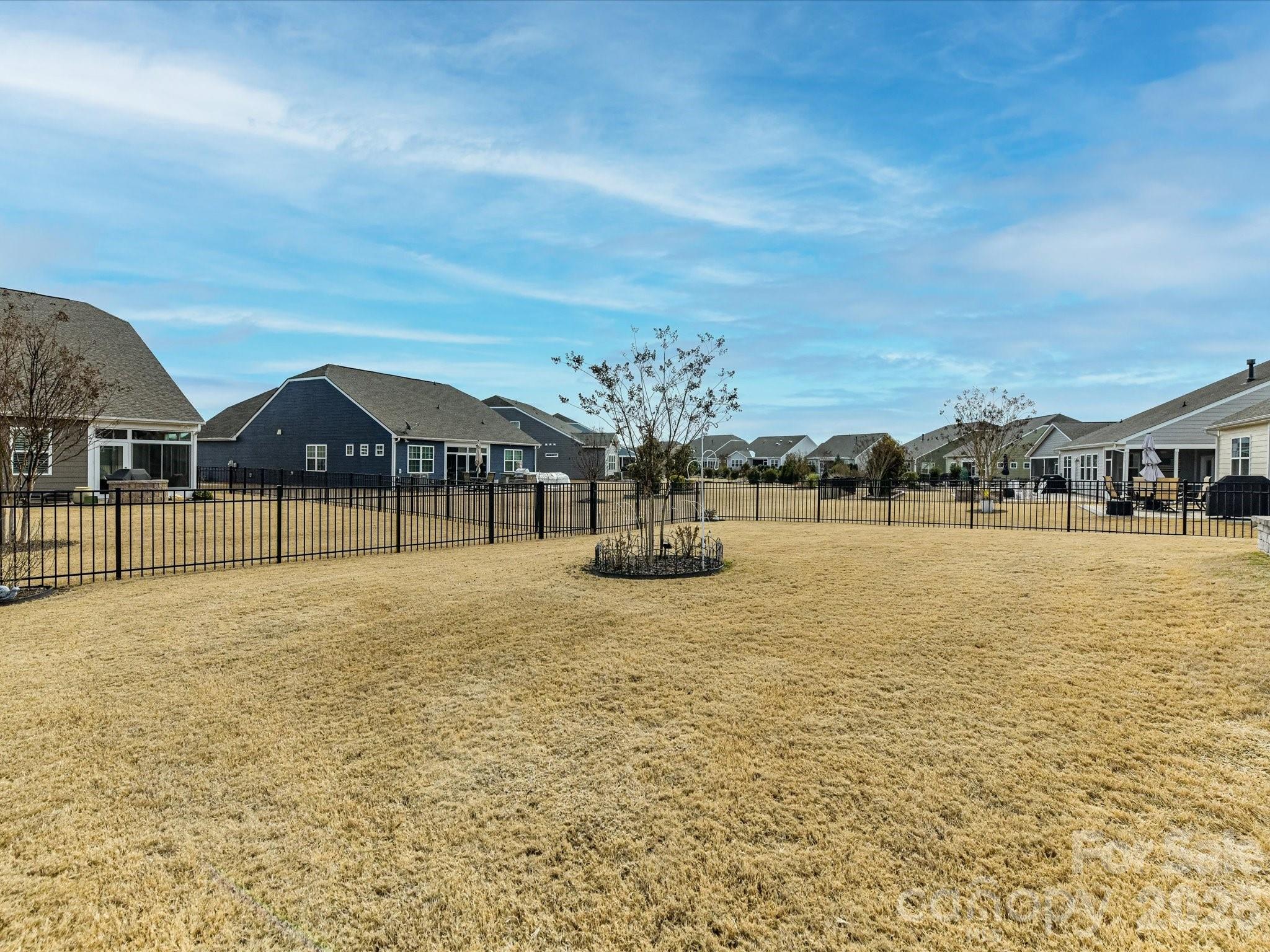 3302 Oliver Stanley Trail Lancaster, SC 29720 - Photo 35 of 48 a view of houses with swimming pool