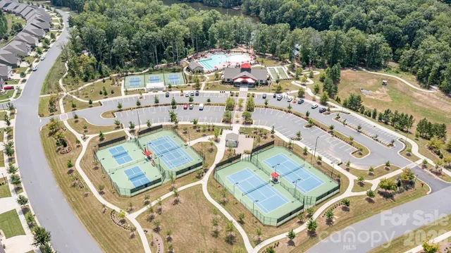 a view of swimming pool and sitting area