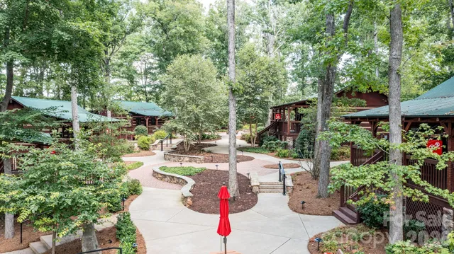a view of a lake with houses in background