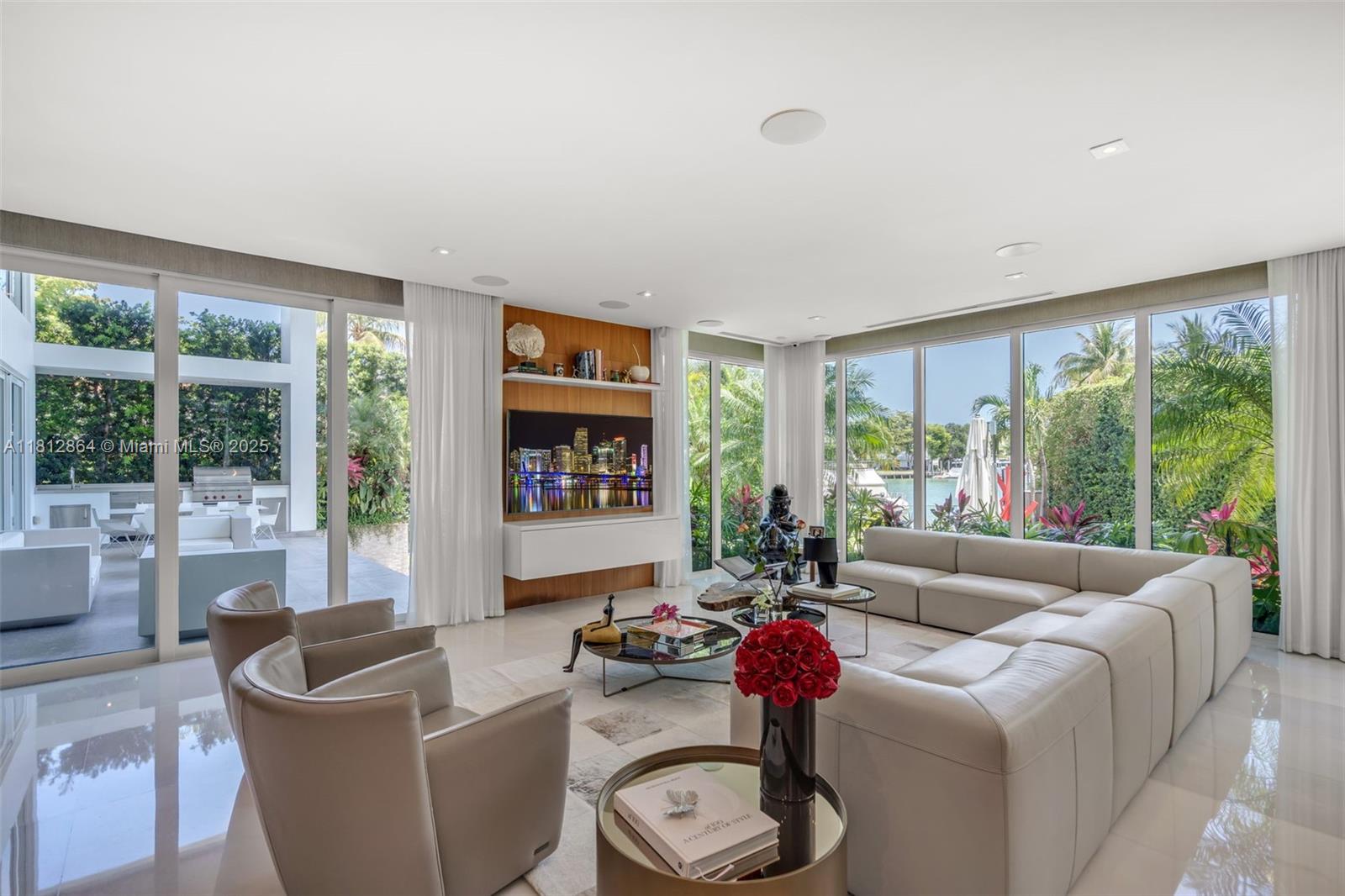 420 Island Drive Key Biscayne, FL 33149 - Photo 20 of 84 a living room with furniture and a large window