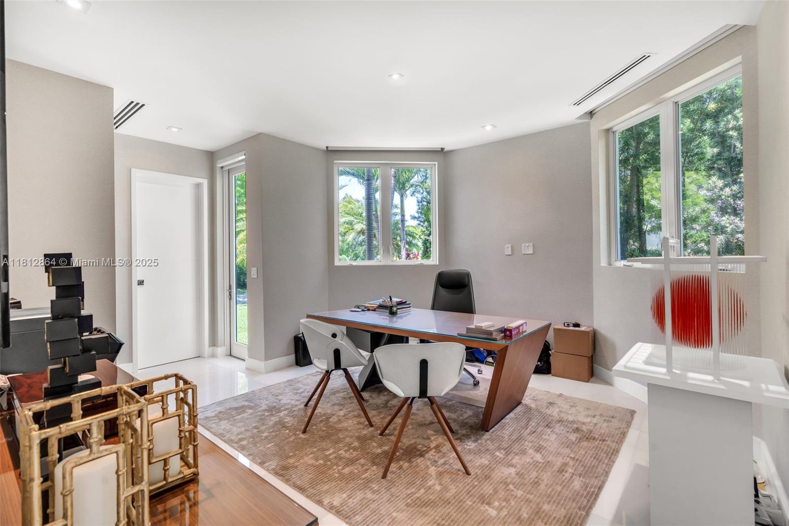 420 Island Drive Key Biscayne, FL 33149 - Photo 27 of 84 a view of a workspace with furniture and a window