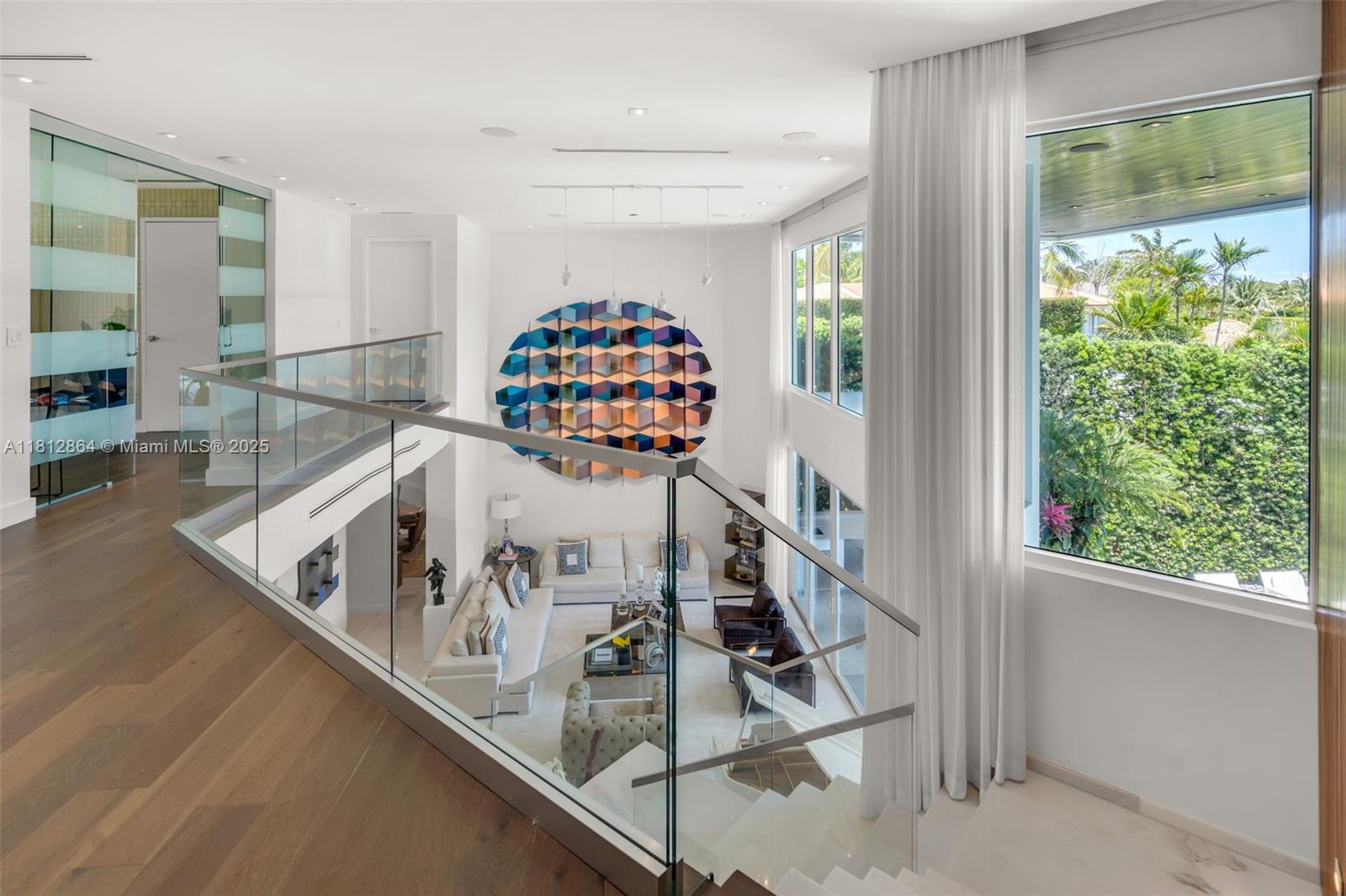 420 Island Drive Key Biscayne, FL 33149 - Photo 31 of 84 a living room with furniture and a floor to ceiling window