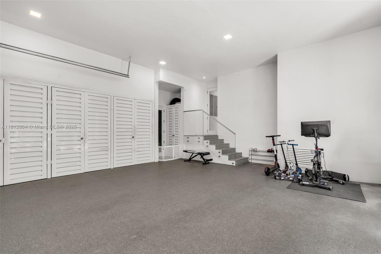 420 Island Drive Key Biscayne, FL 33149 - Photo 47 of 84 a view of a room with gym equipment