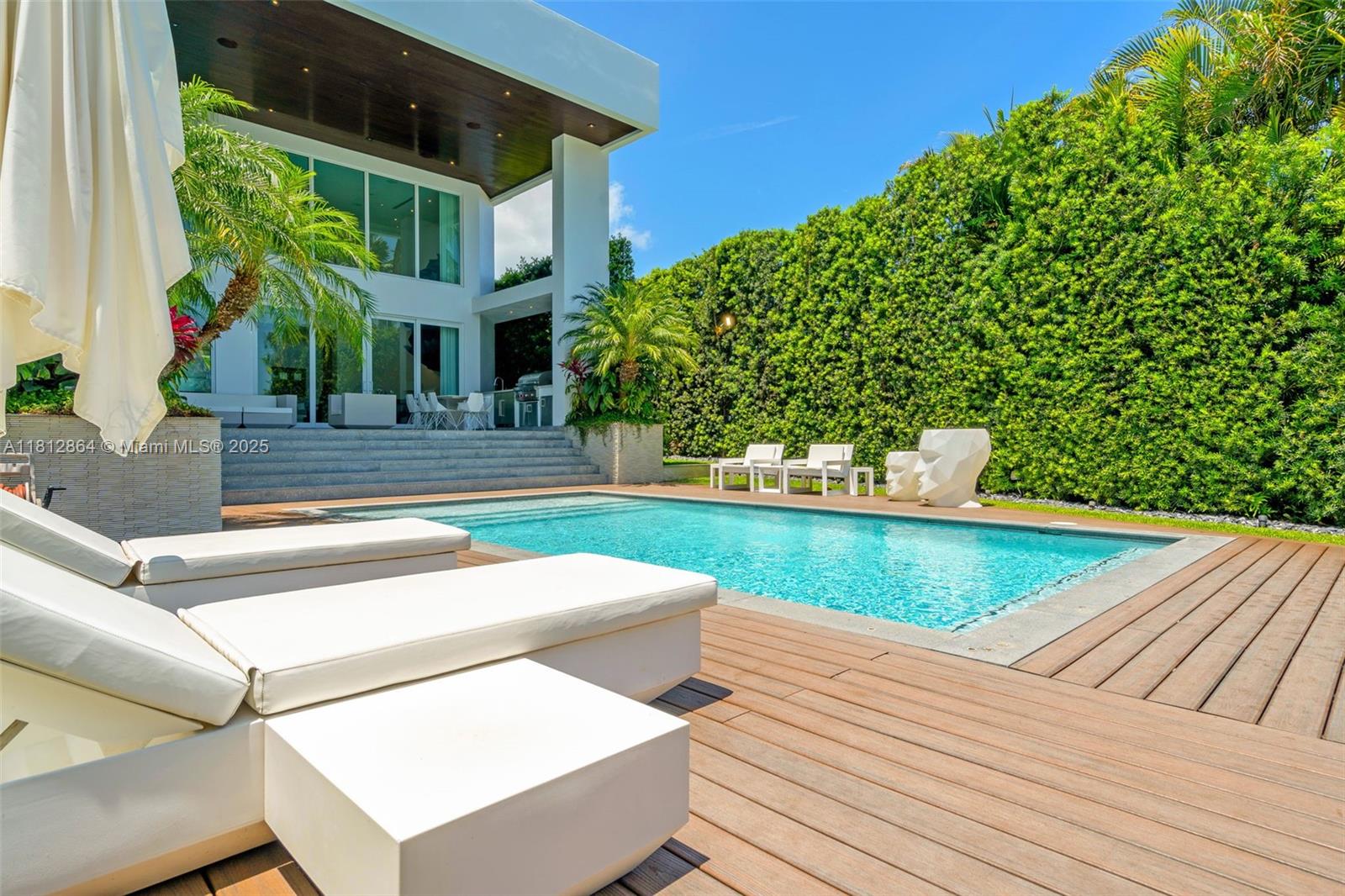 420 Island Drive Key Biscayne, FL 33149 - Photo 55 of 84 a view of an outdoor space with seating area