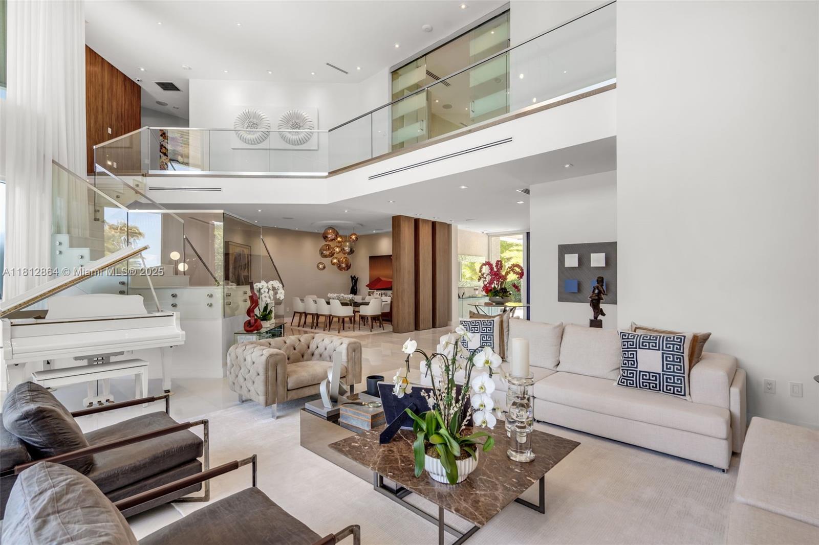 420 Island Drive Key Biscayne, FL 33149 - Photo 8 of 84 a living room with furniture kitchen view and a chandelier