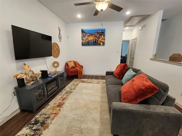 a living room with furniture and a couch