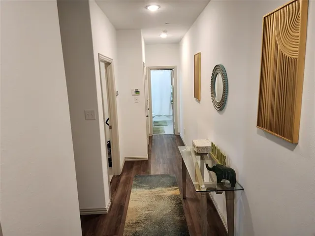 a view of a hallway with elevator