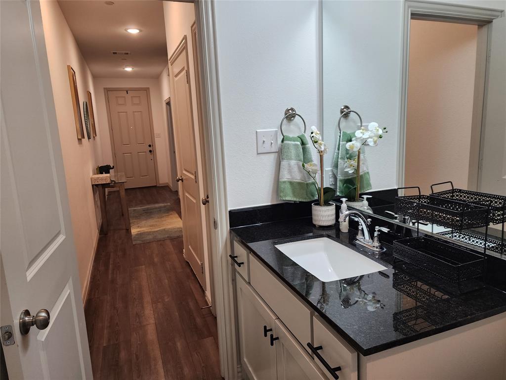 4704 Haltom Road Haltom City, TX 76117 - Photo 25 of 28 a kitchen with sink stove and refrigerator