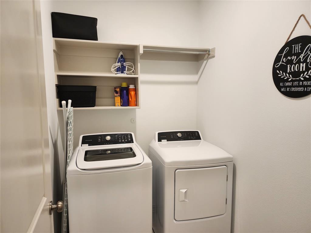 4704 Haltom Road Haltom City, TX 76117 - Photo 26 of 28 a utility room with dryer and washer