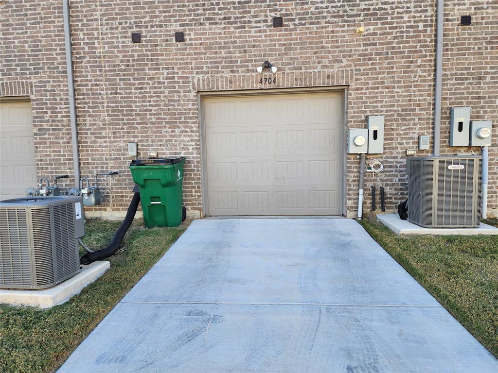 4704 Haltom Road Haltom City, TX 76117 - Photo 27 of 28 a view of a backyard with brick wall