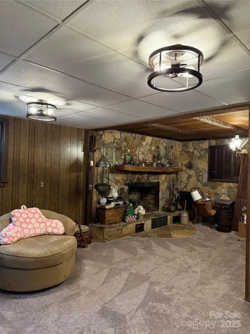 a kitchen with stainless steel appliances kitchen island granite countertop a stove refrigerator and a sink