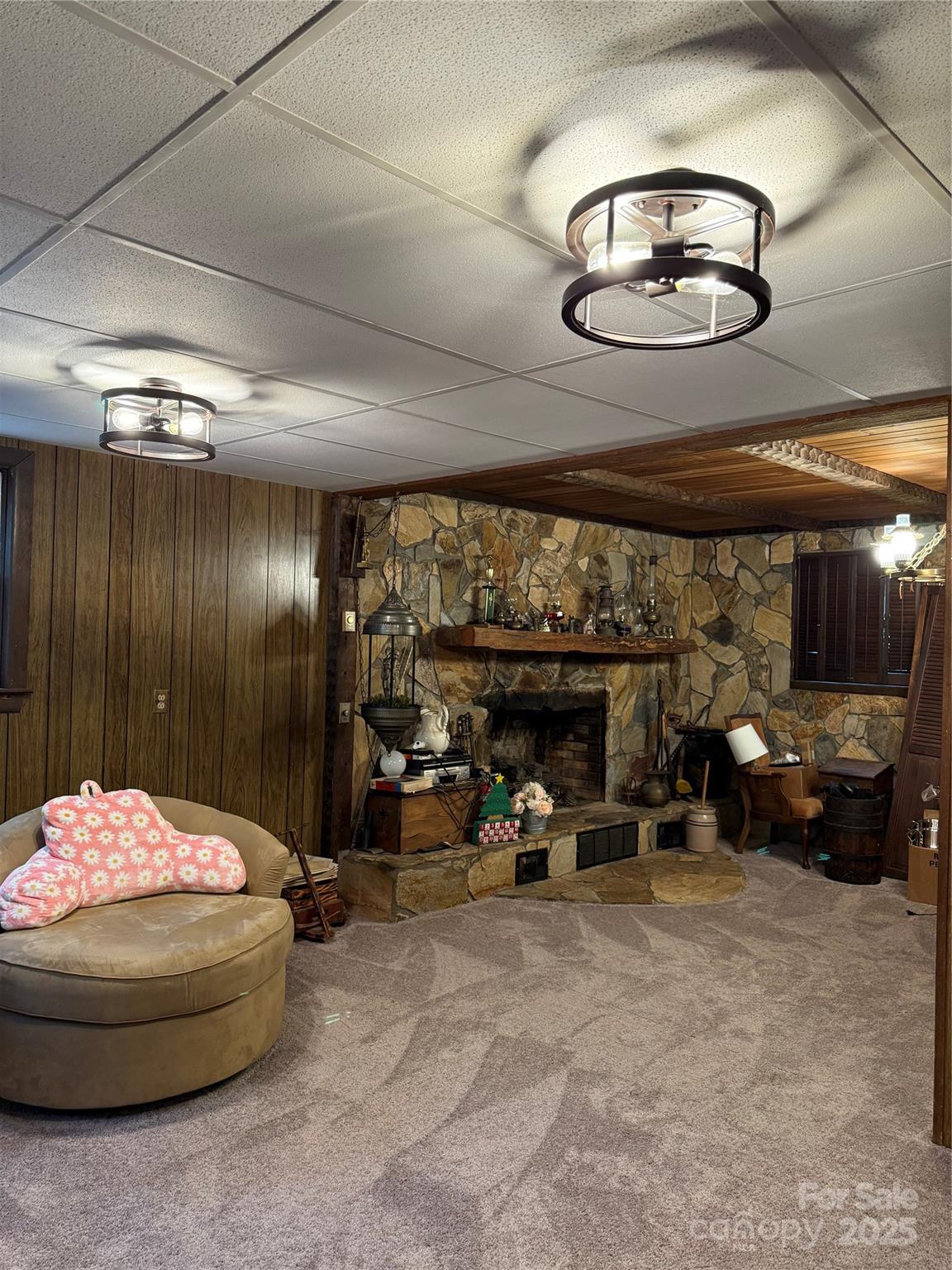 115 Nathaniel Lane Kannapolis, NC 28081 - Photo 13 of 19 a living room with furniture a chandelier and couch