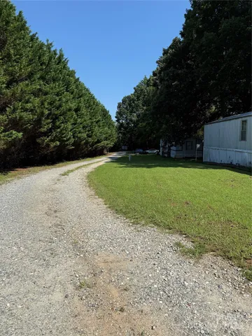 a view of yard with tree