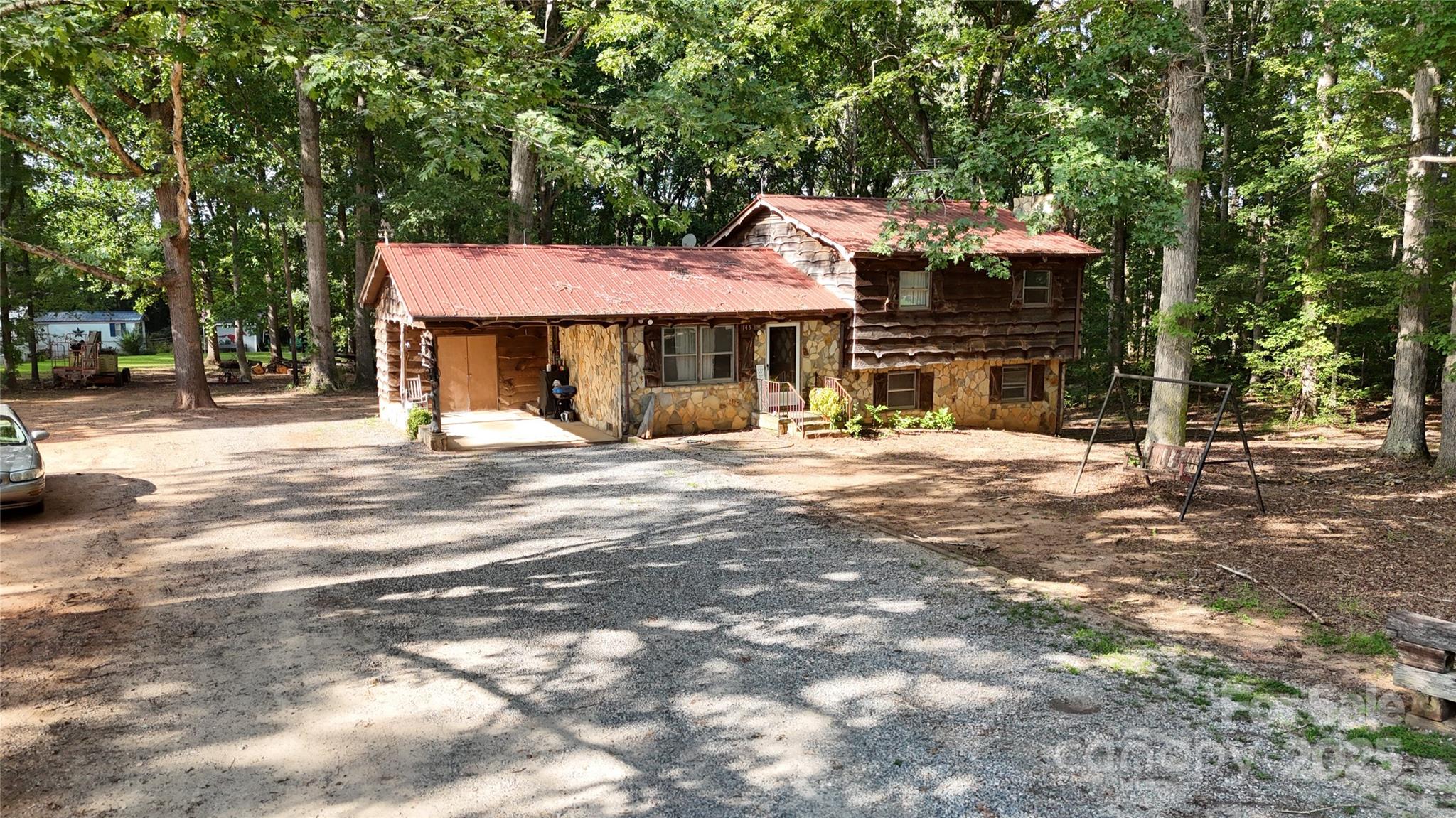 115 Nathaniel Lane Kannapolis, NC 28081 - Photo 3 of 19 a outdoor view of a building with traffic signal lights