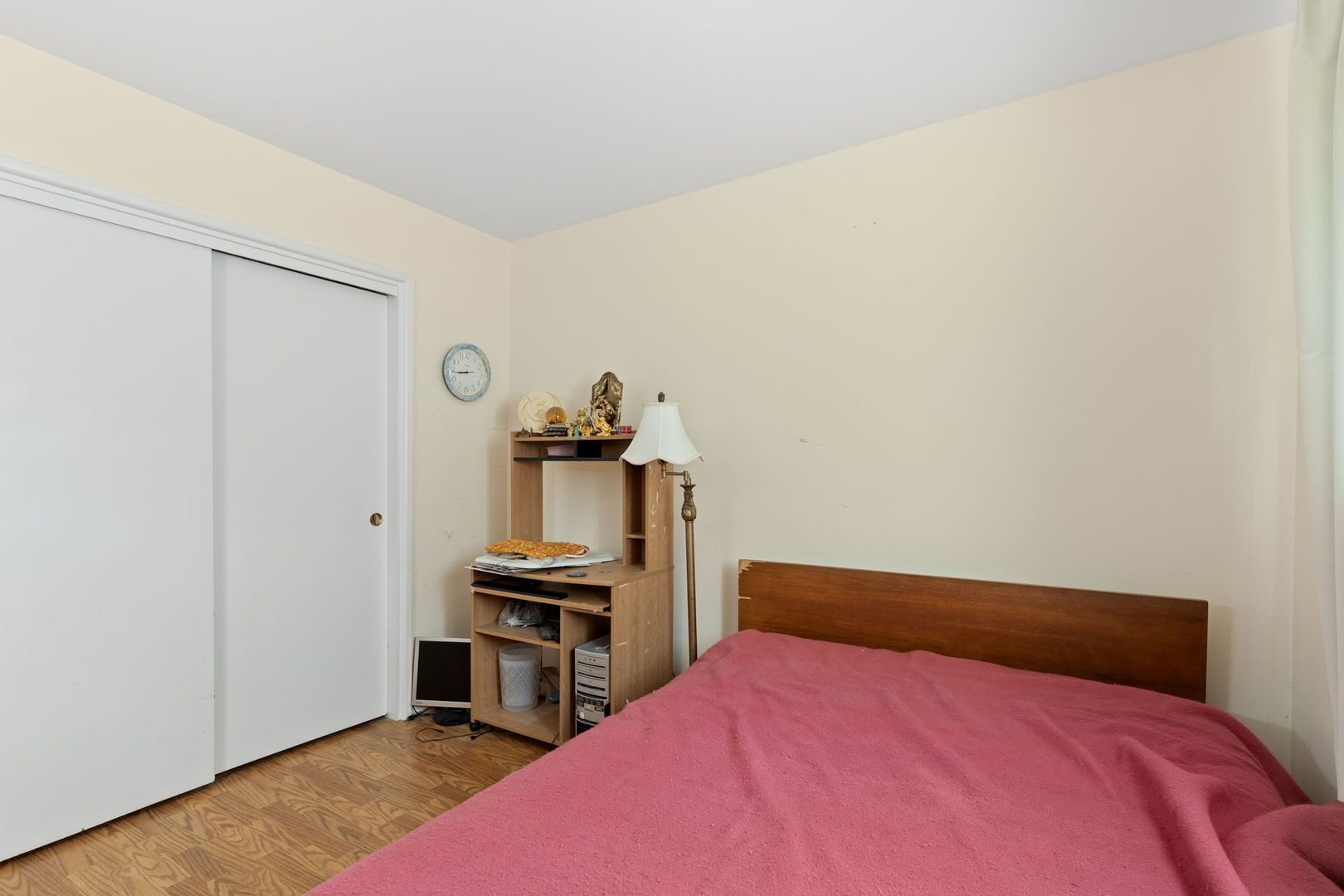 7227 North Ridge Boulevard, Unit 1A Chicago, IL 60645 - Photo 12 of 14 a bedroom with a bed and a desk