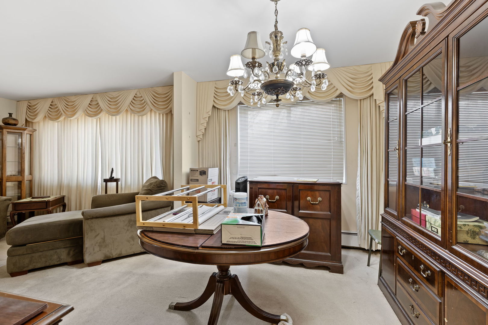 7227 North Ridge Boulevard, Unit 1A Chicago, IL 60645 - Photo 7 of 14 a view of a livingroom with furniture and window
