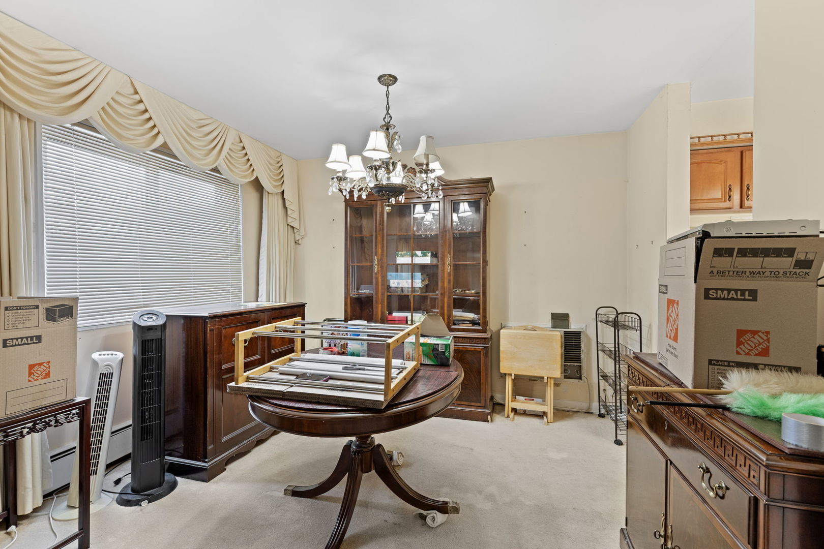 7227 North Ridge Boulevard, Unit 1A Chicago, IL 60645 - Photo 8 of 14 a living room with furniture a piano and a flat screen tv