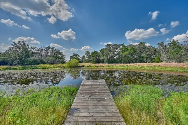 a view of a golf course with a big yard