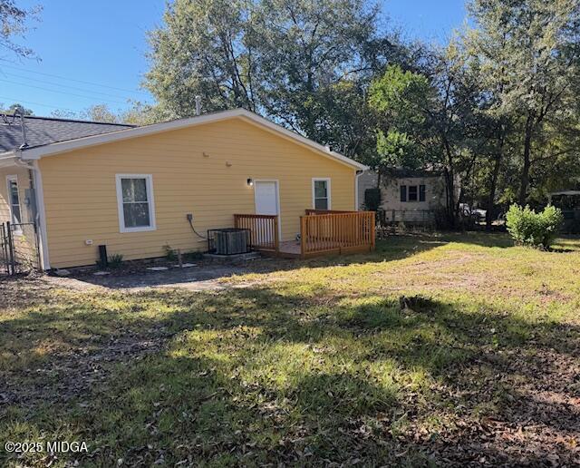 3723 Spencer Circle Macon, GA 31206 - Photo 14 of 18 a view of a backyard with a large tree