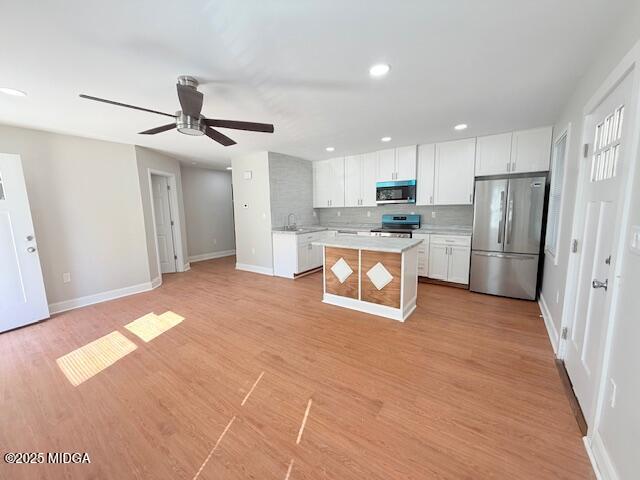3723 Spencer Circle Macon, GA 31206 - Photo 3 of 18 a open kitchen with stainless steel appliances granite countertop a refrigerator and a stove top oven