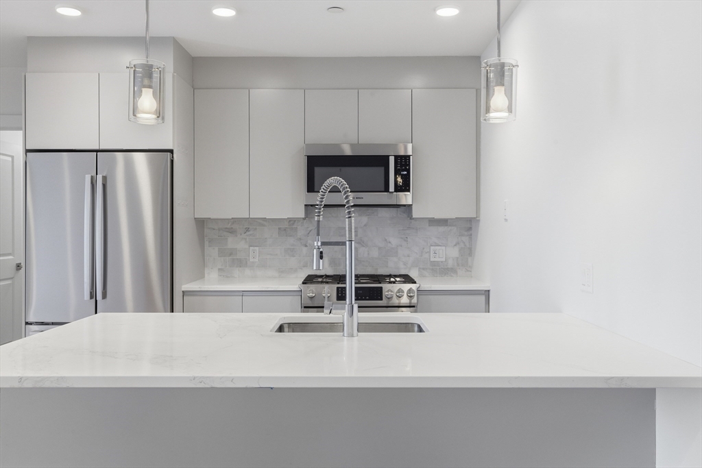 16 Boardman Street, Unit 202 Boston, MA 02128 - Photo 5 of 23
