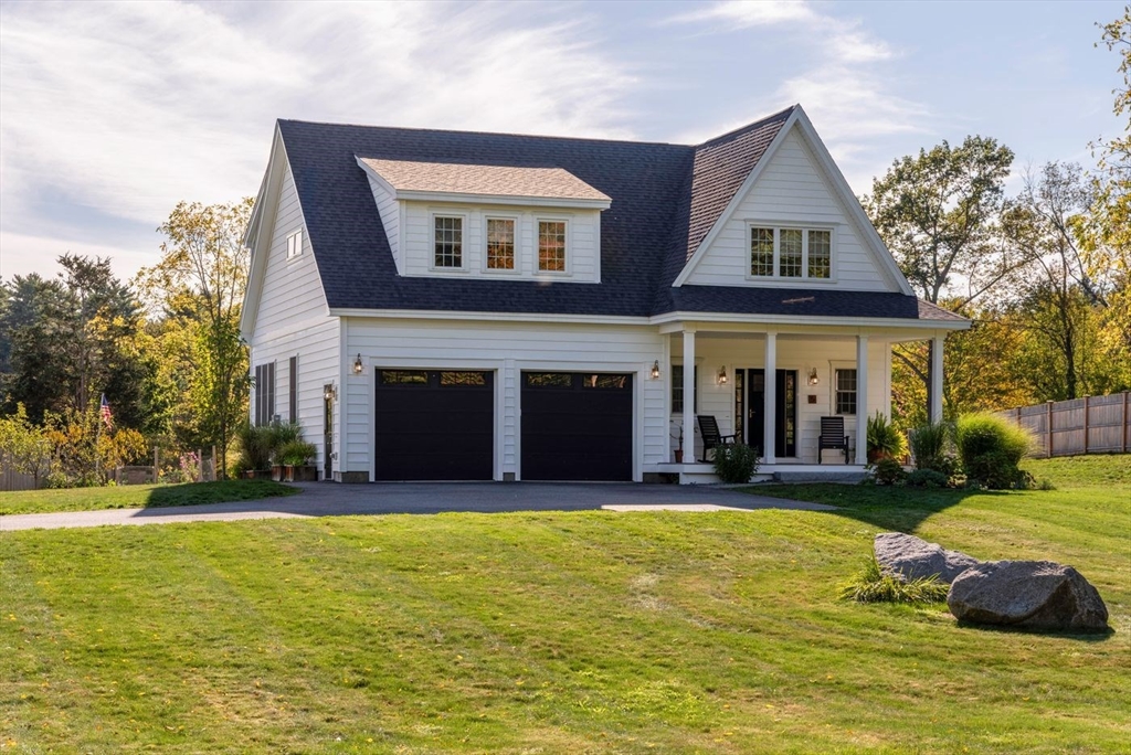 5 John West Road Exeter, NH 03833 - Photo 33 of 33 a view of a house with swimming pool and porch with furniture