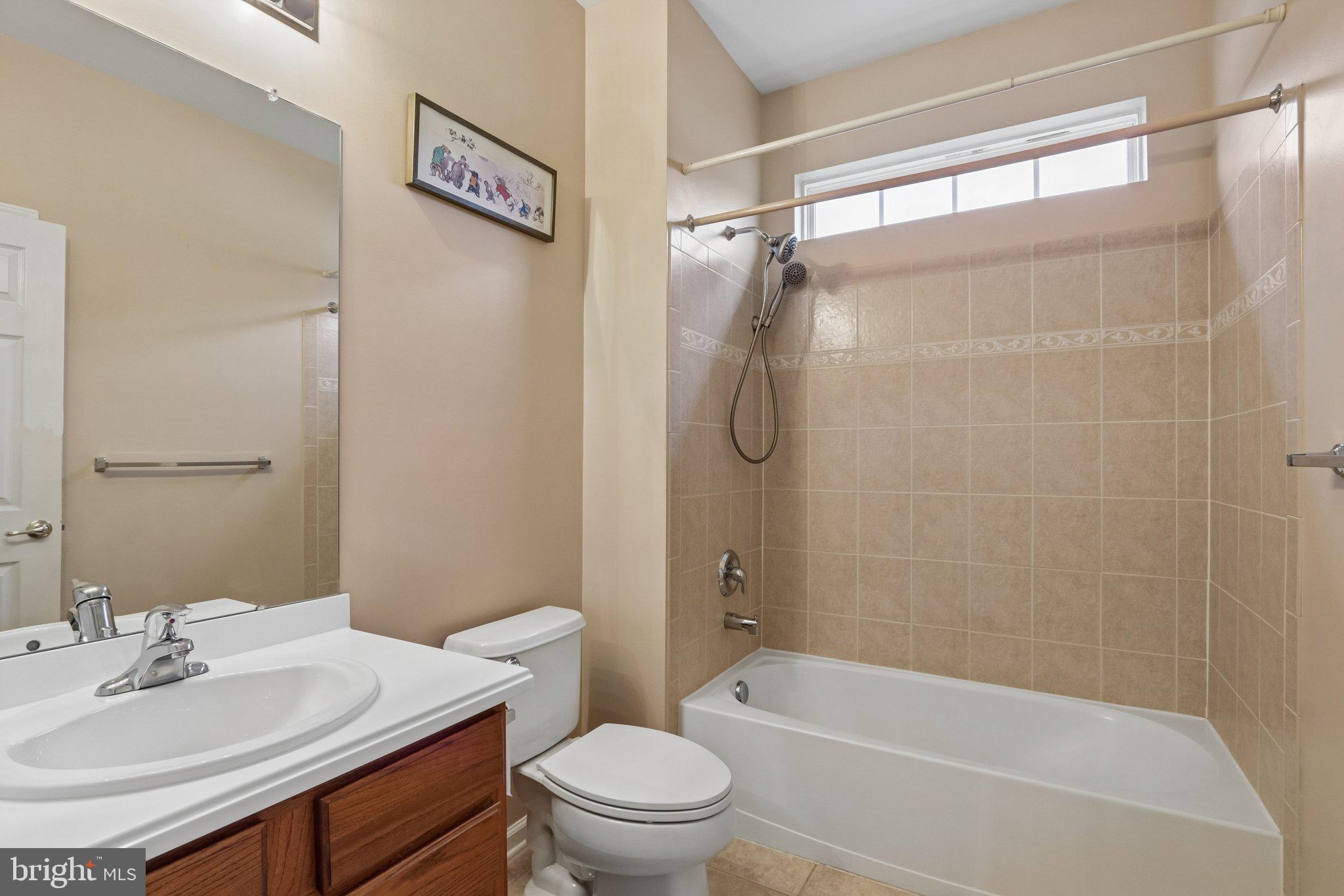 39 Danbury Road Swedesboro, NJ 08085 - Photo 17 of 62 a bathroom with a sink toilet and shower