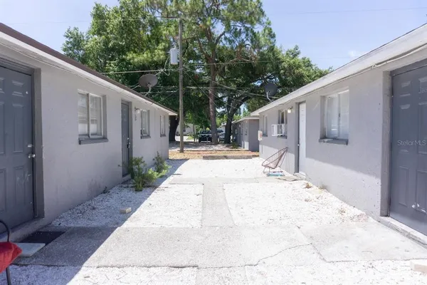 a view of a backyard of the house