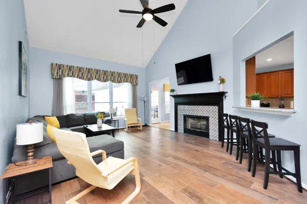 a living room with furniture and a window