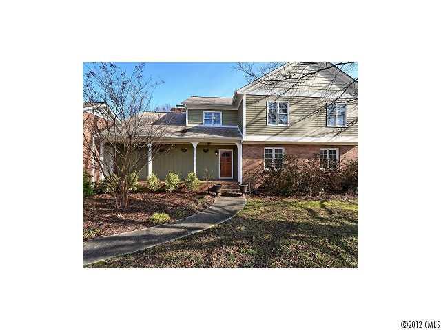 4443 Carmel Road Charlotte, NC 28226 - Photo 1 of 16 a view of a house with a porch