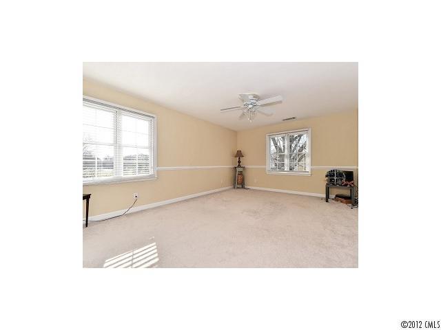 4443 Carmel Road Charlotte, NC 28226 - Photo 11 of 16 a view of an empty room with a window